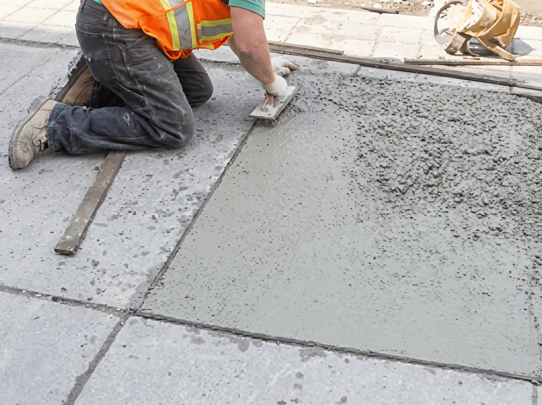 Professional repairing a concrete floor in Omaha, NE